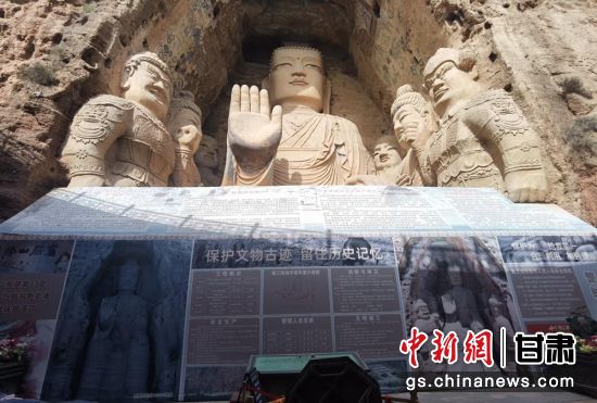 時下，中國“石窟鼻祖”天梯山石窟第13窟大佛足部與局部危巖體搶救性保護項目正在施工。圖為施工現(xiàn)場。陳曉斌 攝