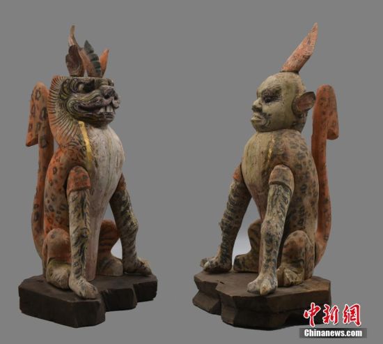 圖為慕容智墓出土鎮(zhèn)墓獸。 中新社發(fā) 甘肅省文物局 供圖